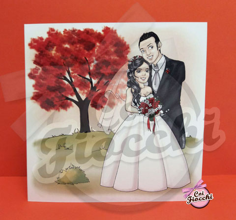 partecipazione nozze con caricatura romantica degli sposi in stile manga con albero sullo sfondo
