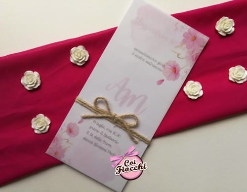 Partecipazione rosa in carta trasparente con fiori