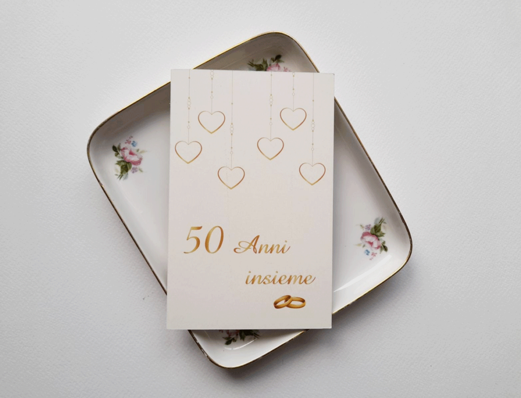 invito anniversario 50 anni matrimonio con cuori e fedi nuziali